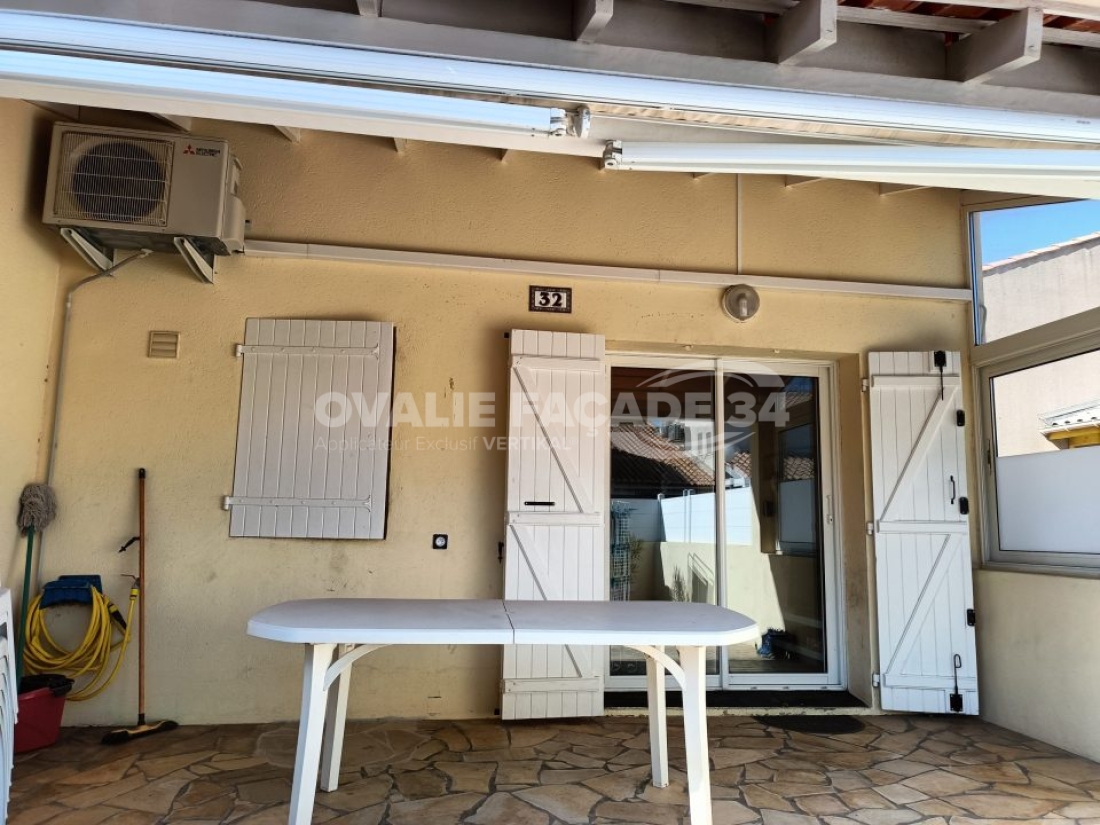 Façade 34 avec table Ovalie et portes.